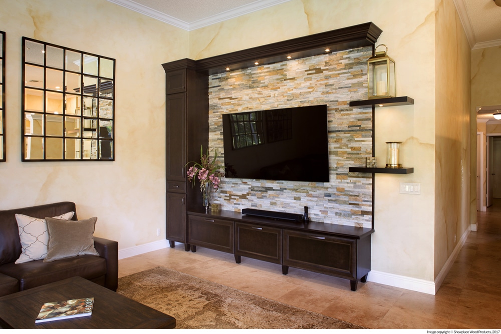 Living area with stone wall, flat screen TV